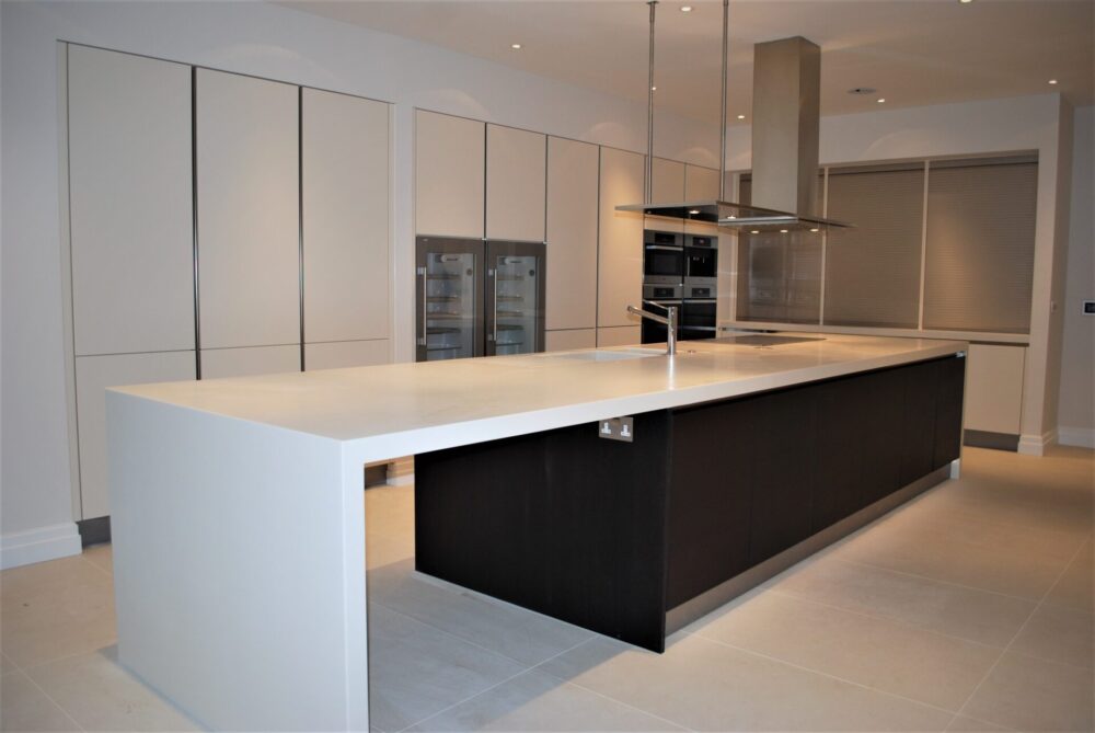 Corian® 50MM FASCIA ISLAND WITH DROP LEG BREAKFAST BAR