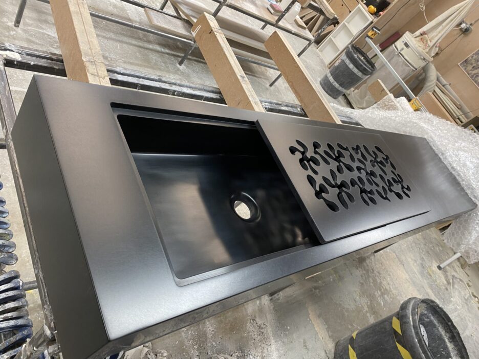 Corian® BESPOKE VANITY WITH FRETWORK COVER