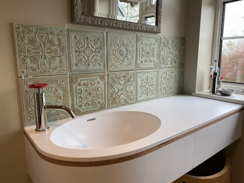 Corian® BESPOKE VANITY WITH PLYWOOD DETAIL