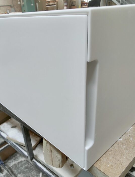 Corian® BESPOKE VANITY WITH SHARK NOSE EDGE DETAIL