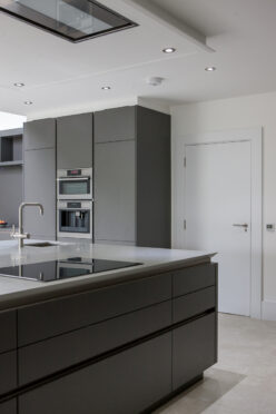 Corian® KITCHEN ISLAND WITH SHARKS NOSE DESIGN