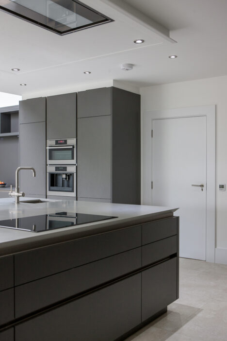 Corian® KITCHEN ISLAND WITH SHARKS NOSE DESIGN