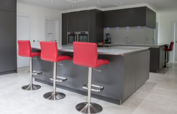 Corian® BREAKFAST BAR WITH SHARKS NOSE DESIGN
