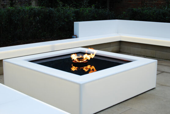 Corian® GLACIER ICE BACKLIT OUTDOOR SEATING AND FIRE PIT
