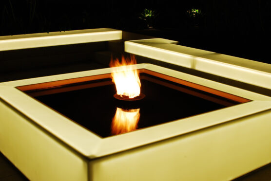 Corian® BACKLIT OUTDOOR SEATING AND FIRE PIT